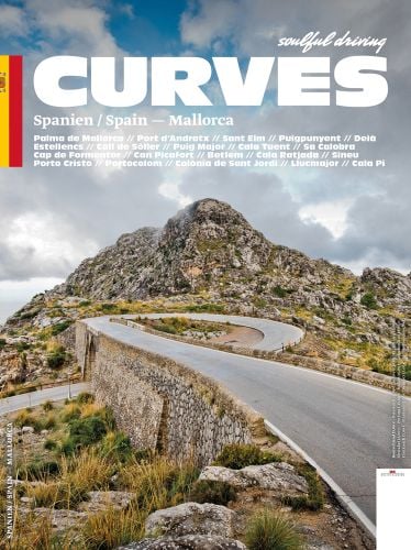 Curved road in mountainous Mallorcan landscape, CURVES: Mallorca in white font above
