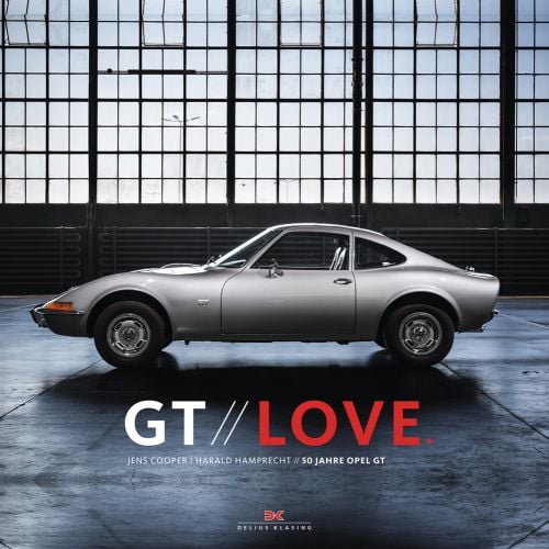 Silver Opel GT in warehouse, on cover of 'GT Love, 50 Years Opel GT', by Delius Klasing.