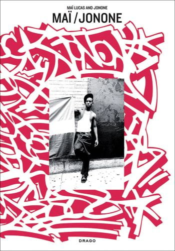 Young black male holds an unidentified flag, on white cover with pink graffitied text, by Drago International Entertainment.