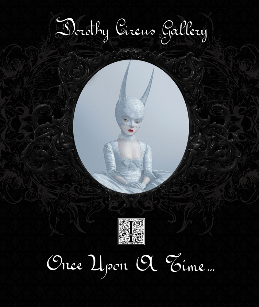Oil painting 'Consort Study' by Ray Caesar, female wearing silver horned head dress, on black cover of 'Once Upon A Time, The Dorothy Circus Gallery (vol. 1)', by Drago.