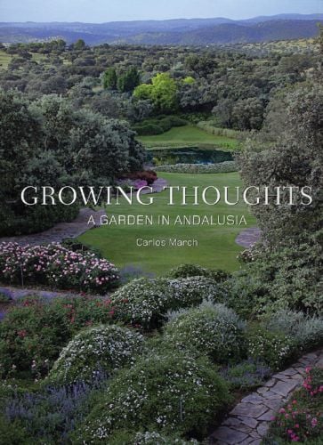 Landscaped gardens with mountains behind, on cover of 'Growing Thoughts: A Garden in Andalusia', by Ediciones El Viso.