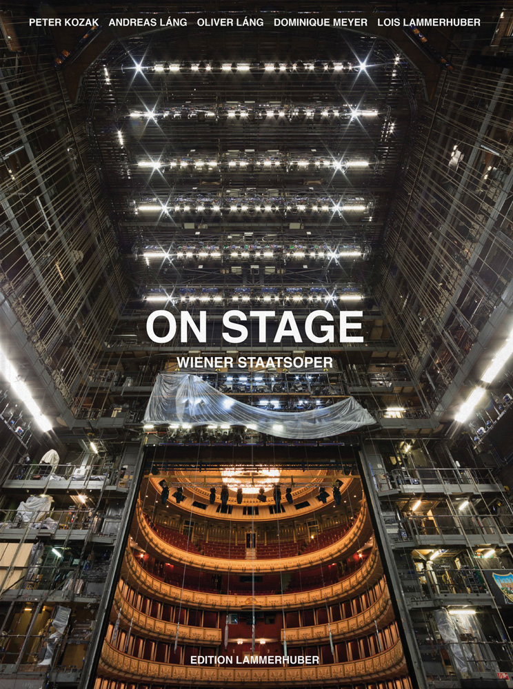 Dramatic ceiling structure of theatre with stage lights, on cover of 'On Stage, Vienna Opera House', by Edition Lammerhuber.