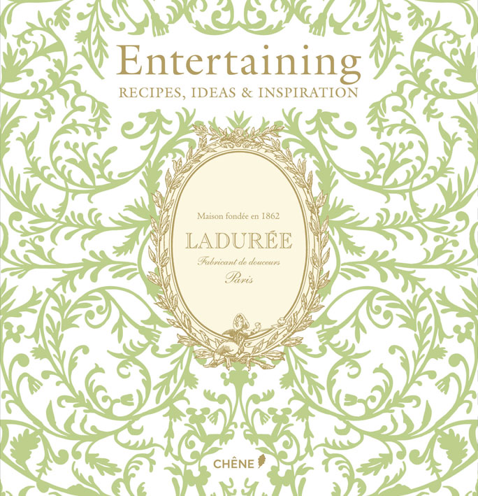 Green foliage on cream cover of 'Laduree, Entertaining: Recipes, Ideas & Inspiration', by Editions du Chene.