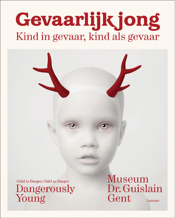 Young child with white face, red antlers on forehead, on cover of 'Dangerously Young, Child in Danger, Child as Danger', by Lannoo Publishers.