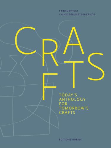 Capitalised yellow font on dark duck egg blue cover of 'Crafts, Today's Anthology for Tomorrow's Crafts', by Editions Norma.