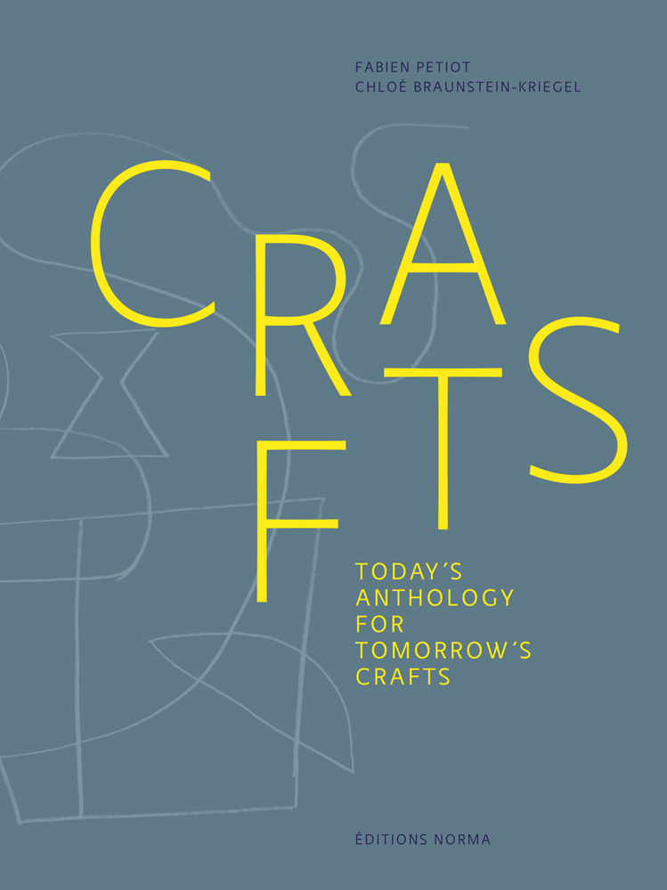 Capitalized yellow font on dark duck egg blue cover of 'Crafts, Today's Anthology for Tomorrow's Crafts', by Editions Norma.