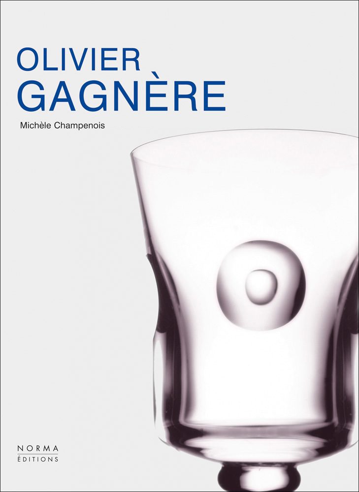 Glass goblet on white cover of 'Olivier Gagnere', by Editions Norma.