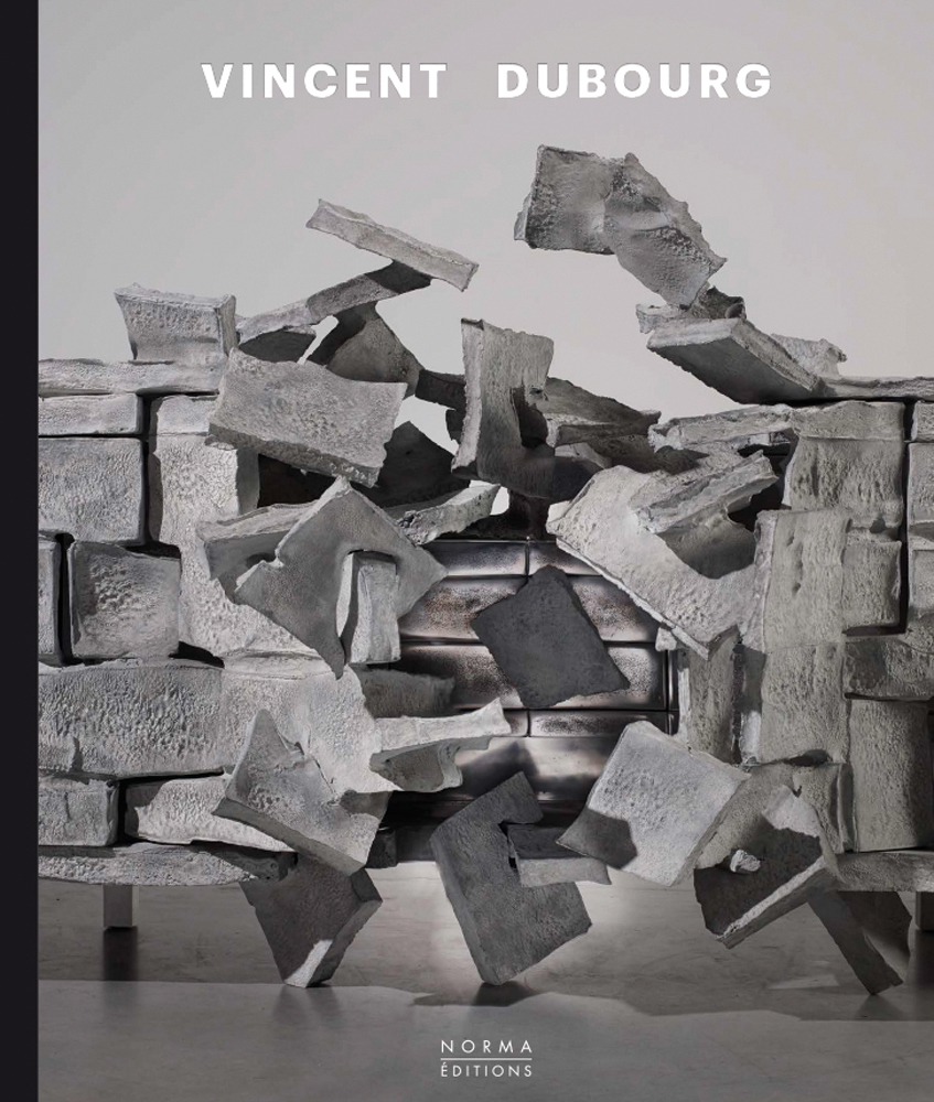 Aluminium cabinet with exploding pieces to front, on cover of 'Vincent Dubourg', by Editions Norma.