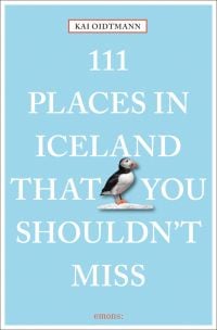 Puffin near center of sky blue cover of '111 Places in Iceland That You Shouldn't Miss', by Emons Verlag.