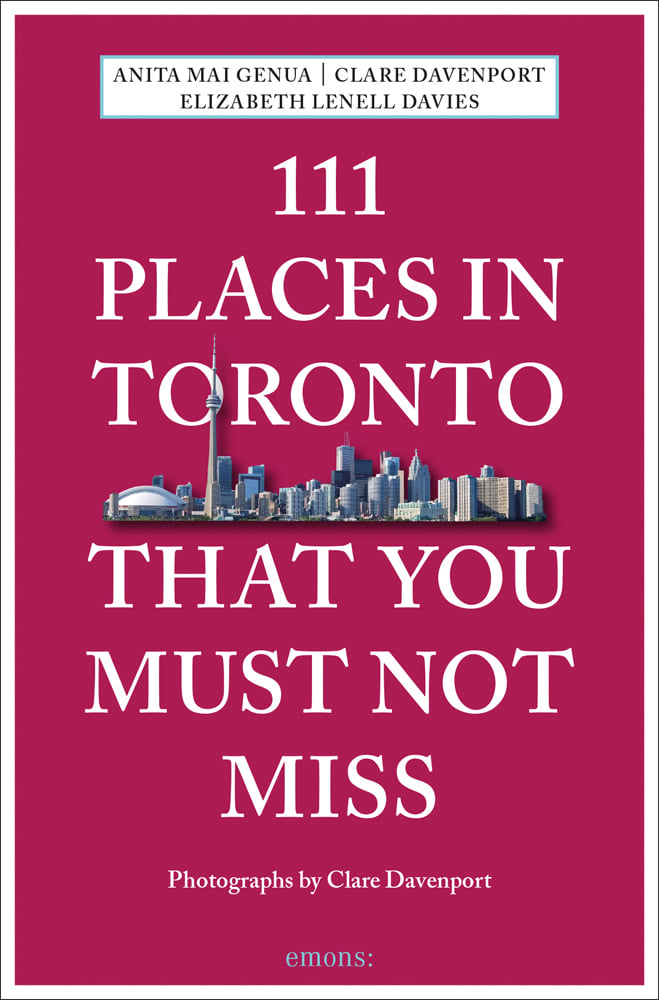 City skyline near center of burgundy cover of '111 Places in Toronto That You Must Not Miss', by Emons Verlag.