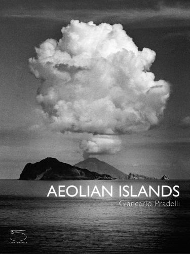 Book cover of The Aeolian Islands, featuring a black and white shot of erupting volcano with white clouds above. Published by 5 Continents Editions.