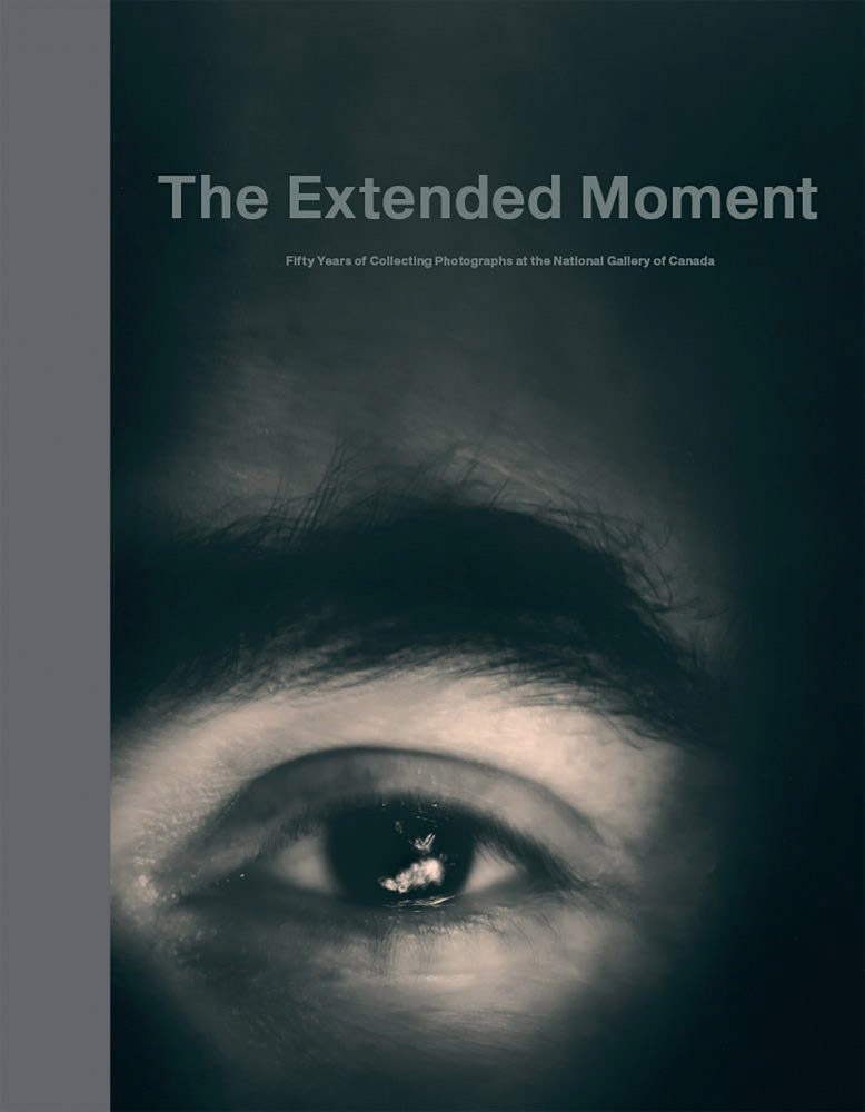 Book cover of The Extended Moment, Fifty Years of Collecting Photographs at the National Gallery of Canada, featuring a black and white photo of left eye and brow of face. Published by 5 Continents Editions.