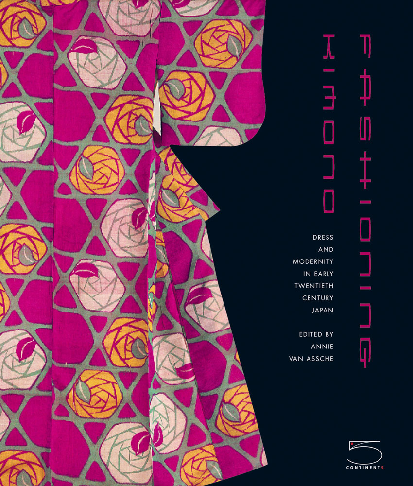 Pink kimono fabric with rose design, black cover, FASHIONING KIMONO in pink font down left edge.