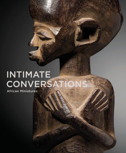 Carved wood figure, hands crossed over chest, grey cover, INTIMATE CONVERSATIONS African Miniatures in white to centre left.