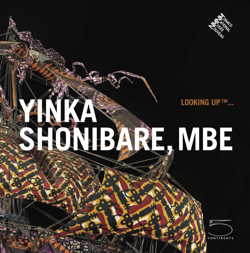 Black book cover of Yinka Shonibare, MBE Looking Up ... featuring a large ship with sails made from bold African fabric, published by 5 Continents Editions.