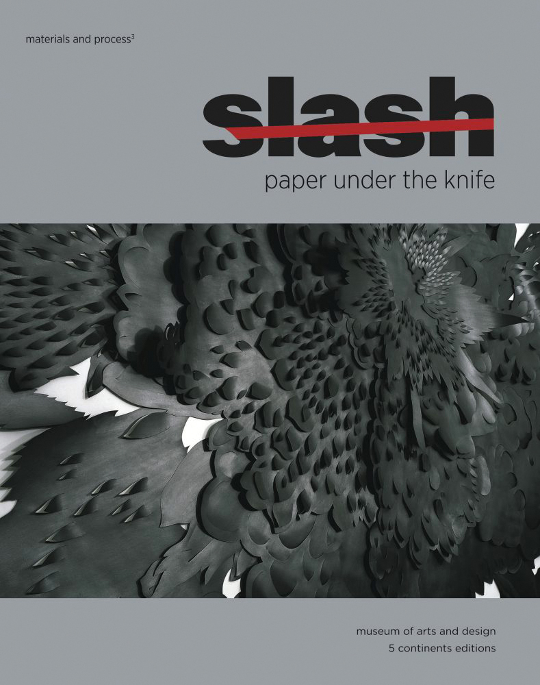 Book cover of David Revere McFadden's Slash, Paper Under the Knife, featuring a black paper installation on white wall by Andreas Kocks. Published by 5 Continents Editions.