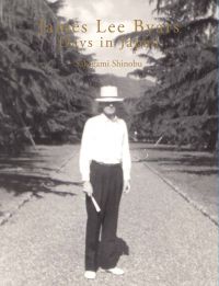 Book cover of James Lee Byars: Days in Japan, with the artist standing on a pathway lined with large conifer trees. Published by Floating World Editions.