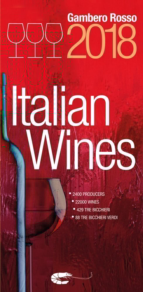 Glass of red wine with bottle on cover of 'Italian Wines 2018', by Gambero Rosso.