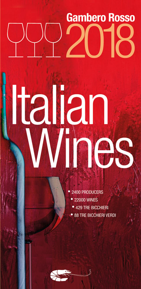 Glass of red wine with bottle on cover of 'Italian Wines 2018', by Gambero Rosso.