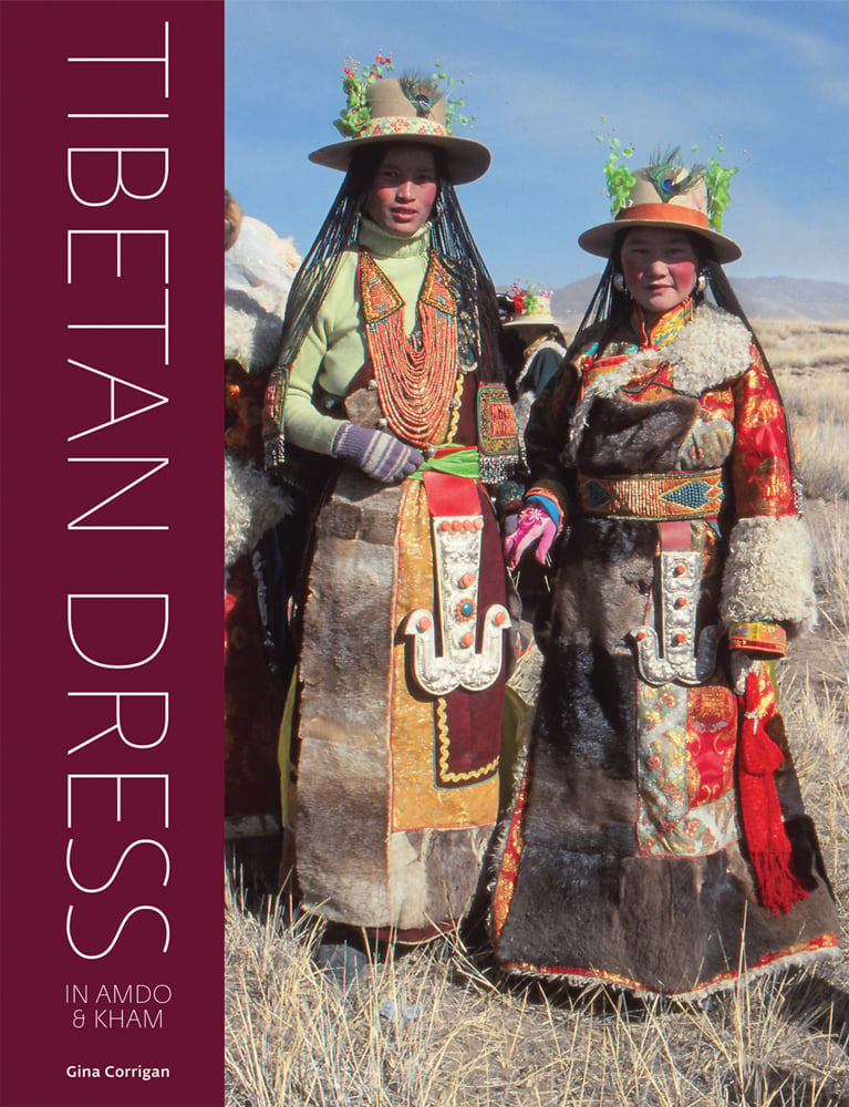 Two Tibetan women in robes and hats, on cover of 'Tibetan Dress in Amdo & Kham', by Hali Publications.