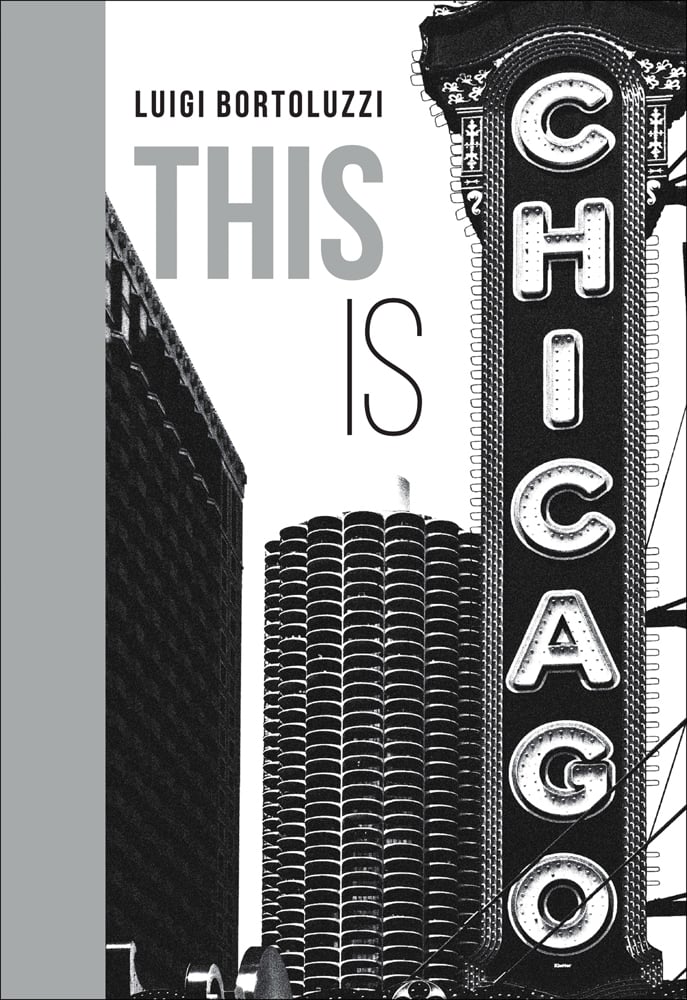 THIS IS in grey and black font on white cover, CHICAGO in big lights down skyscraper, grey left border