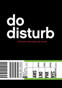 Luggage label on black cover of 'Do Disturb, Encounters with Modern Day Nomads', by Lannoo Publishers.