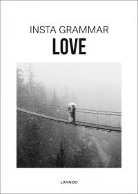 Couple standing on rope bridge, under white umbrella, sheltering from snow, on white cover of 'Insta Grammar: Love', by Lannoo Publishers.