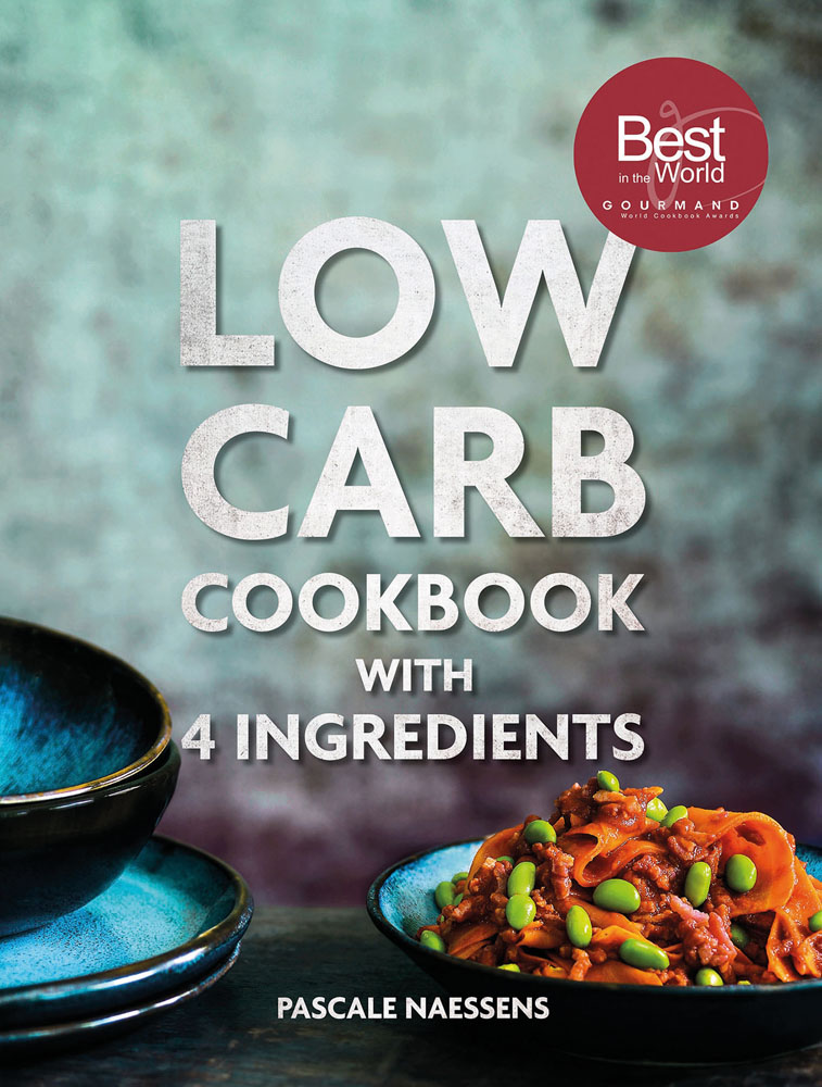 Bowl of orange food with green edamame beans, on cover of 'Low Carb Cooking With 4 Ingredients', by Lannoo Publishers.