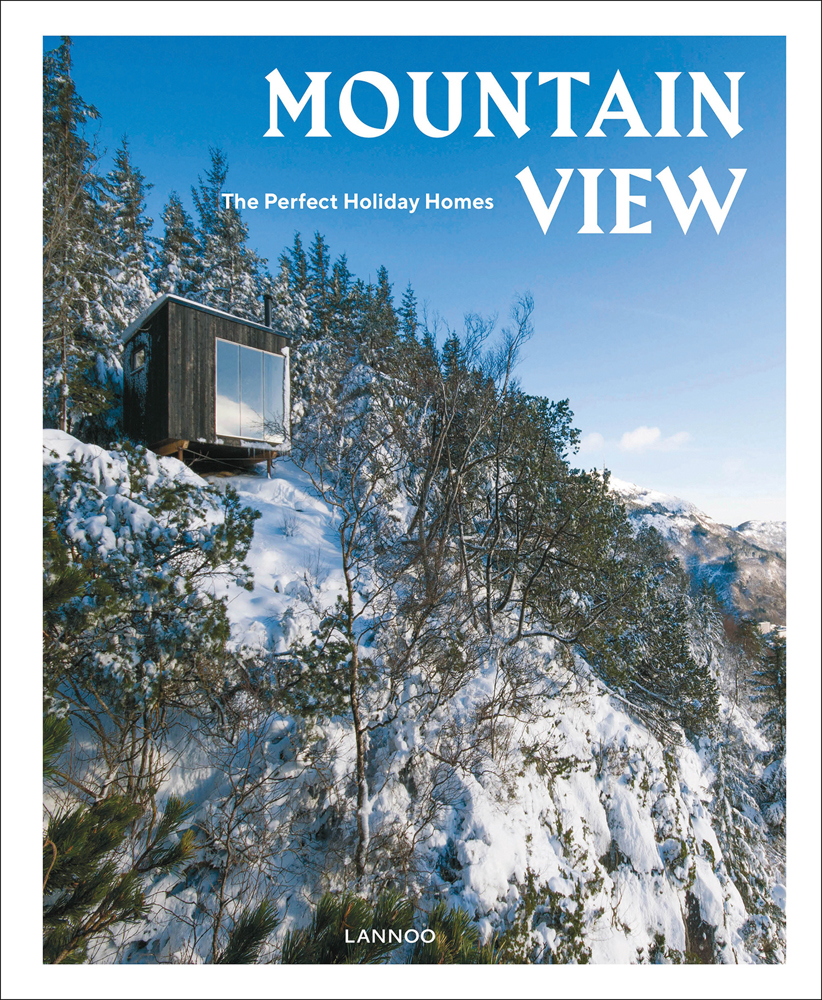 Wood building on snowy mountain side, bright blue sky, Mountain View The Perfect Holiday Homes in white font above