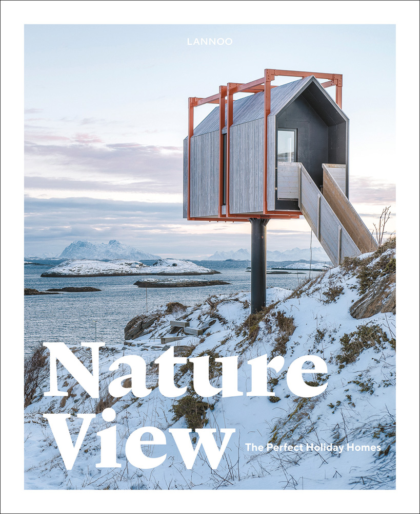 Modern, luxury cabin on remote Norwegian island, covered in snow, on cover of 'Nature View, The Perfect Holiday Homes', by Lannoo Publishers.