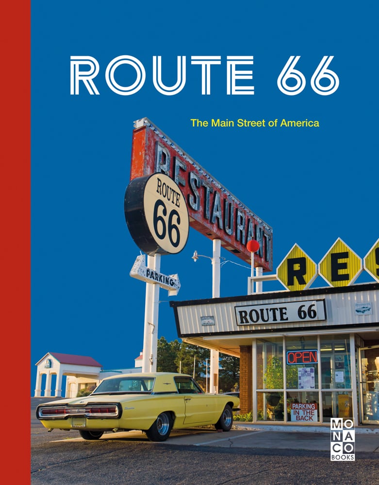 American restaurant on Route 66, yellow car parked out front, blue sky, ROUTE 66 in double lined white font above