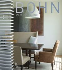 Book cover of Laura Bohn: Ways of Seeing, with an interior living space with long dining table with soft furnished chairs. Published by Pointed Leaf Press.