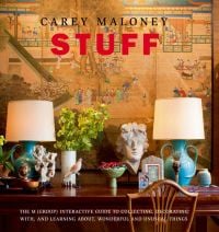 Book cover of Stuff: The M(Group) Interactive Guide to Collecting, Decorating With, and Learning About, Wonderful and Unusual Things, with a table of objects: two lamps, vase of flowers, and photo frames. Published by Pointed Leaf Press.