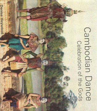 Four Cambodian dancers in traditional costume, in front of river, on cover of 'Cambodian Dance', by River Books.