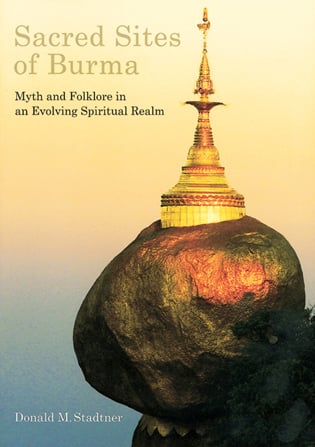 Kyaiktiyo Pagoda with a granite boulder covered with gold leaves, on cover of 'Sacred Sites of Burma', by River Books.