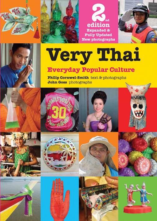 Traditional Thai icons; Buddha statues, folk art, Thai Policeman, on cover of 'Very Thai', by River Books.