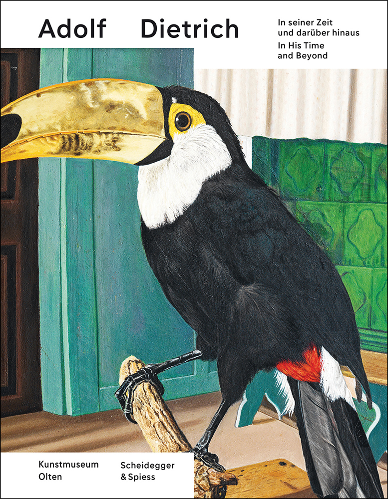 Book cover of Adolf Dietrich in His Time and Beyond, with a painting of a a toucan perched on a branch inside a living space. Published by Scheidegger & Spiess.