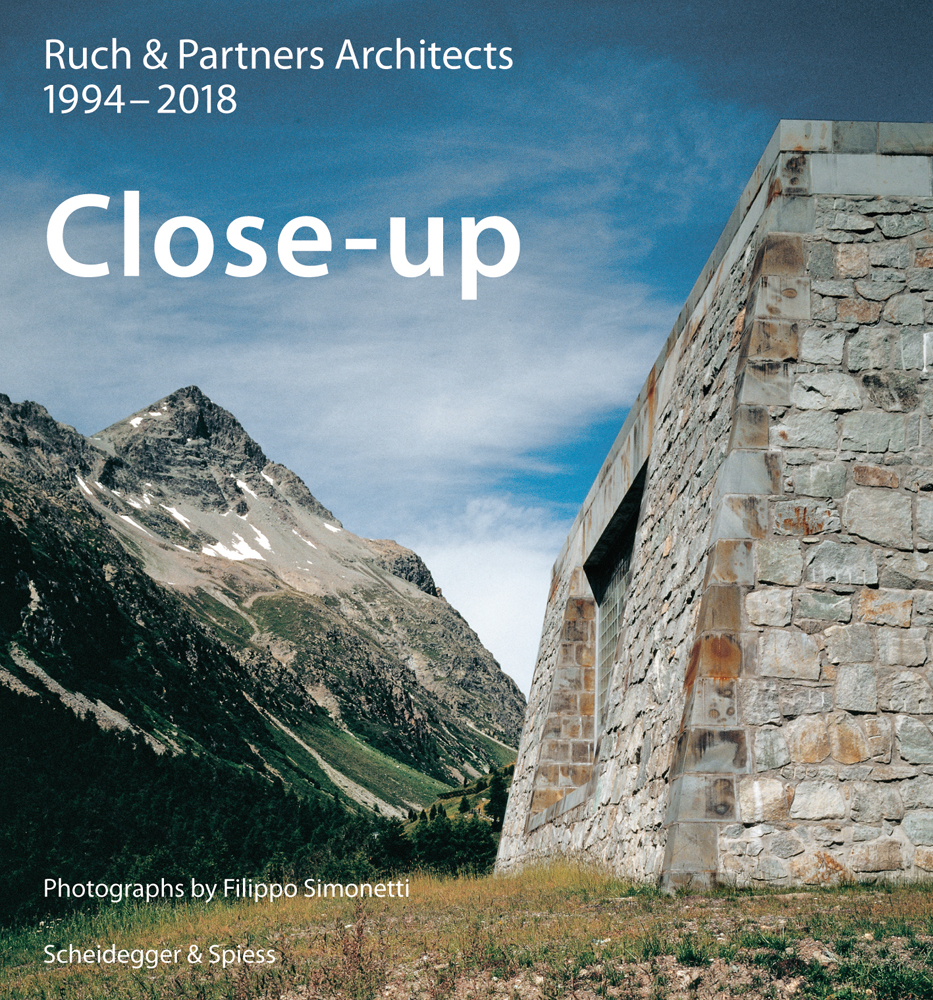Book cover of Close-up - Ruch & Partner Architects 1994-2016, featuring a stone structure with mountainous landscape behind. Published by Scheidegger & Spiess.