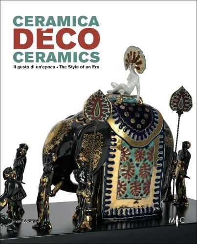 Black and gold ceramic elephant, female rider, fan on head, white cover, DÉCO CERAMICS in red and mint font above