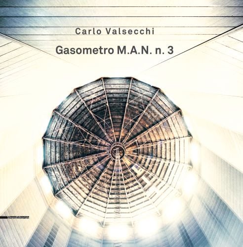 Aerial view of geometrical top of Gasometro, Carlo Valsecchi Gasometro M.A.N. n. 3 in dark grey font above