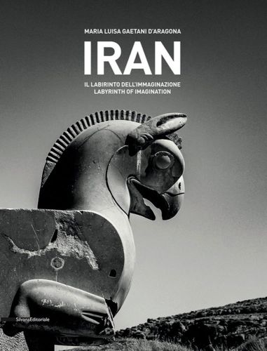 Black and white shot of one head of Huma bird sculpture in Iran, IRAN in white font above.