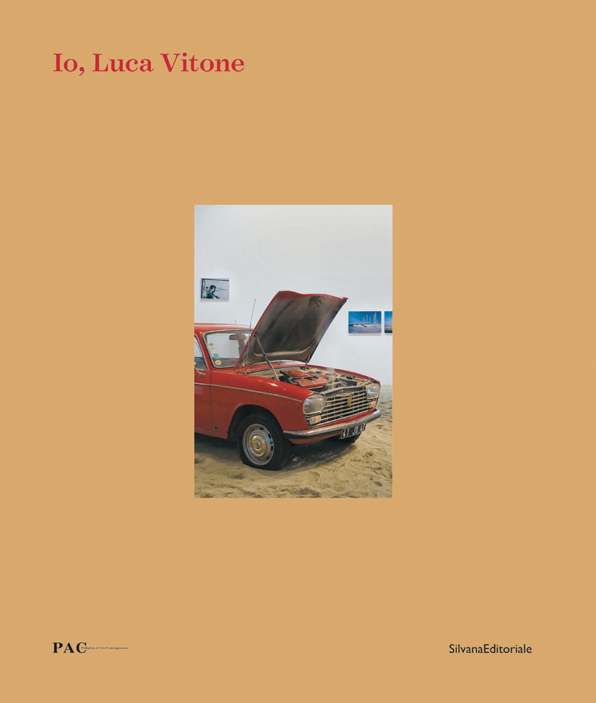 Mars red Peugeot 204, on sand, bonnet open, on orange cover, Io, Luca Vitone in red font to top left
