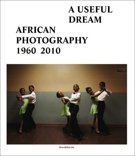 3 pairs of African child dancers, white cover, A USEFUL DREAM AFRICAN PHOTOGRAPHY 1960 2010 in black font above