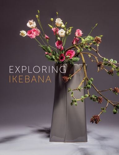 Book cover of Exploring Ikebana, featuring a grey vase containing a floral arrangement of pink and white flowers branches of dark berries. Published by Stichting.