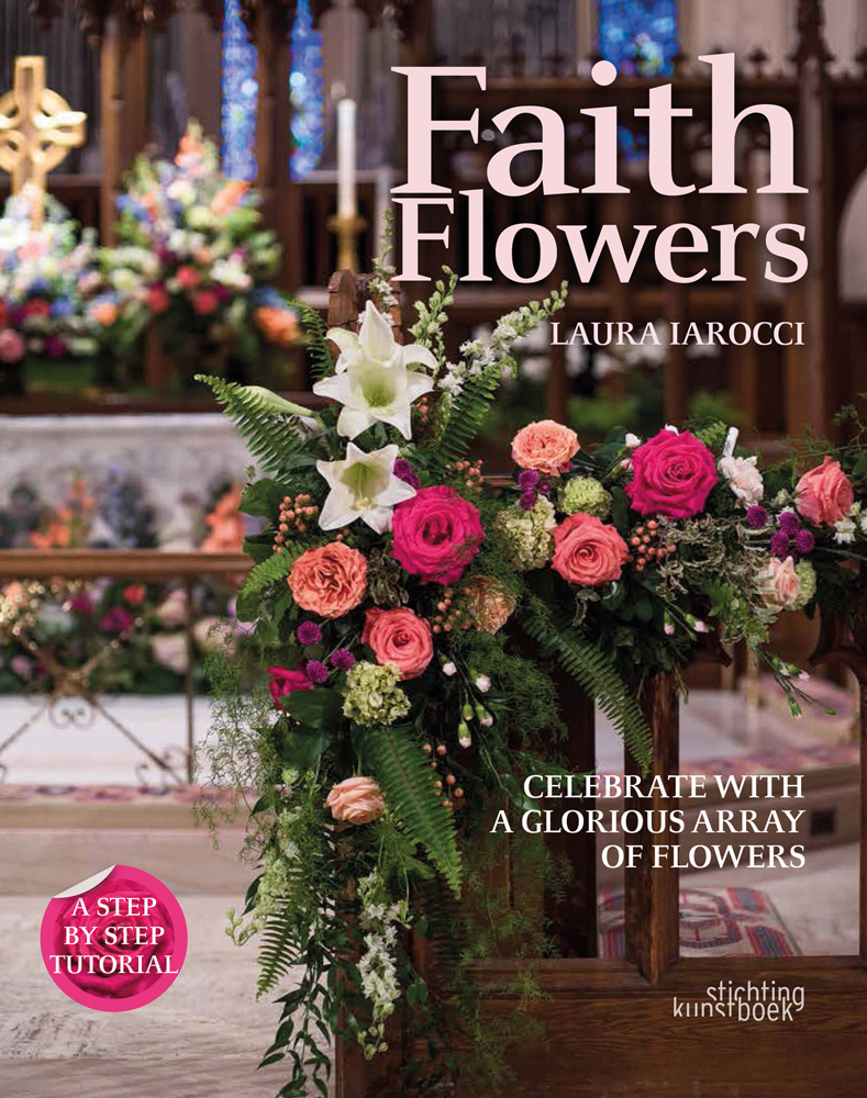 Church pew decorated with pink roses, white lilies and green fern fronds, Faith Flowers in pale pink font above