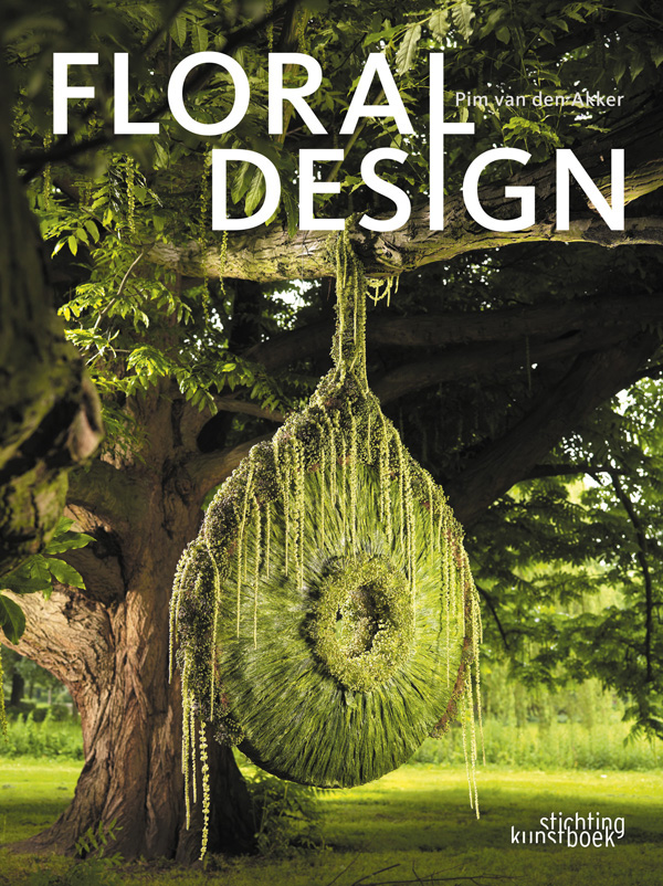Book cover of Floral Design: Pim van den Akker, featuring a green sculptural artwork made from foliage, hanging from branch of tree. Published by Stichting Kunstboek.