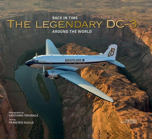 Breitling DC-3 twin-engine propeller aircraft, flying over Grand Canyon, THE LEGENDARY DC-3 in gold font above