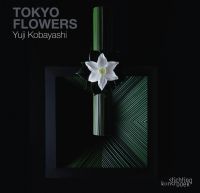 Black book cover of Yuji Kobayashi, Tokyo Flowers, with cylindrical pole with a white dahlia to front. Published by Stichting.