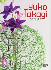 Book cover of Yuko Takagi: Monograph, featuring a hollow sphere made of a green twine with purple clematis on top. Published by Stichting Kunstboek.