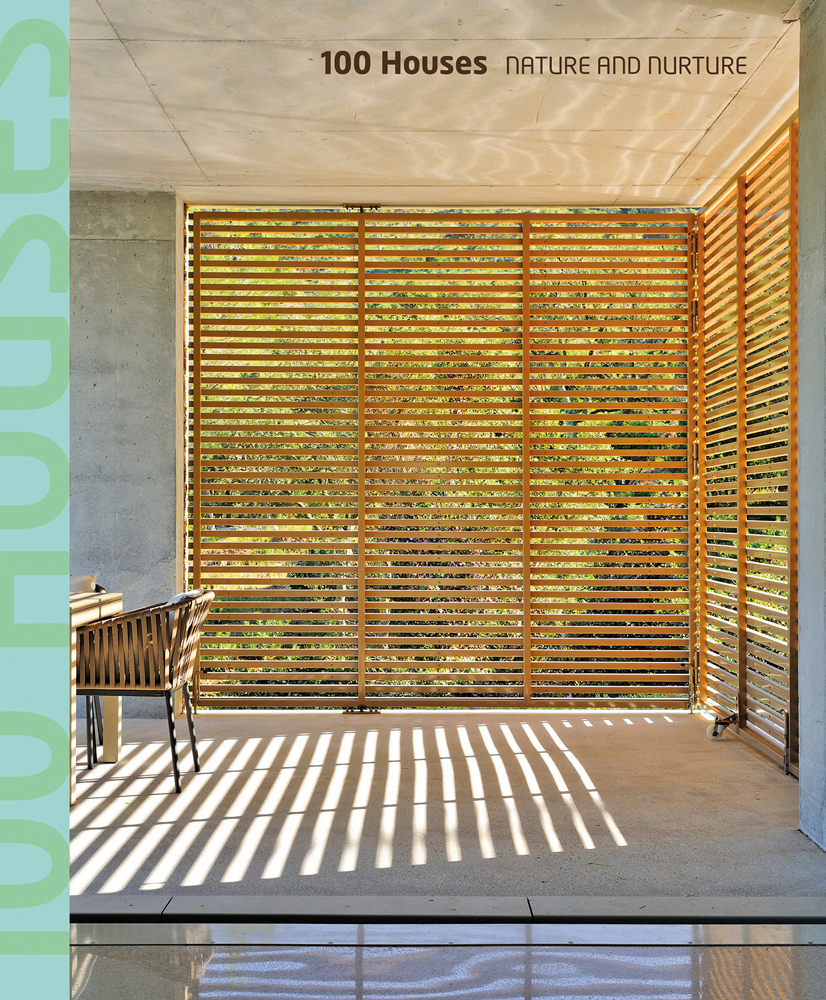 Interior space with wood slated panels revealing exterior landscape, 100 Houses NATURE AND NURTURE in brown font above.